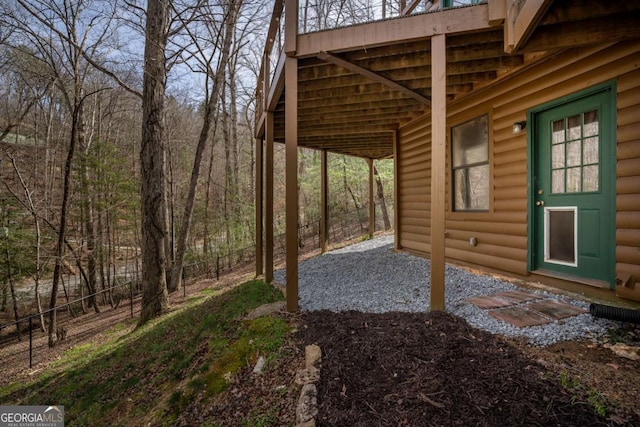 view of yard with a carport and driveway