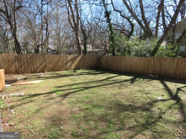 view of yard with fence