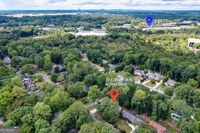 aerial view featuring a forest view