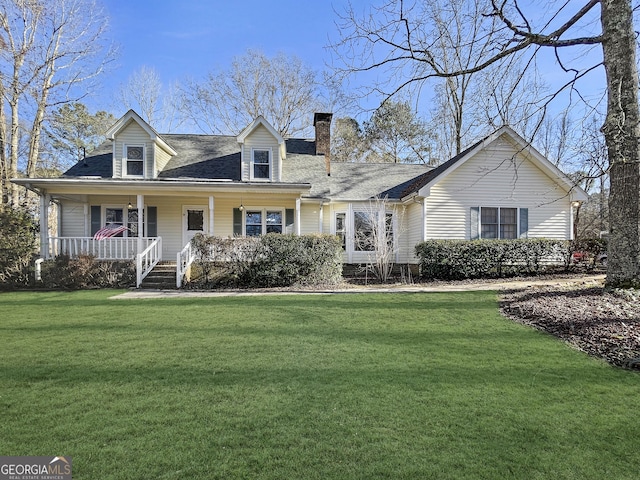 cape cod house featuring a front lawn, covered porch, and a chimney