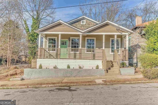 view of front of property featuring covered porch