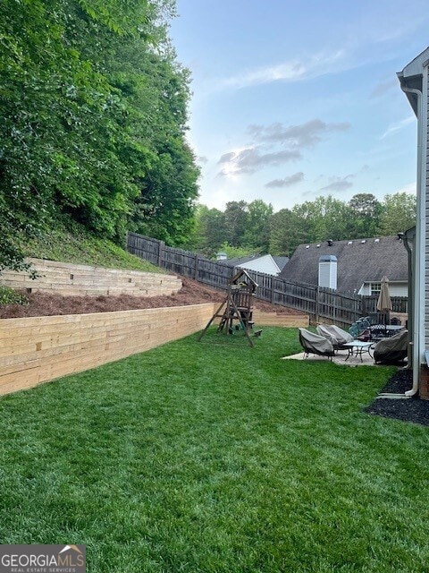 view of yard featuring a fenced backyard