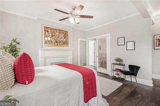 bedroom featuring ornamental molding, wood finished floors, baseboards, and access to outside