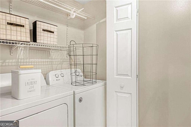 laundry room with laundry area and separate washer and dryer