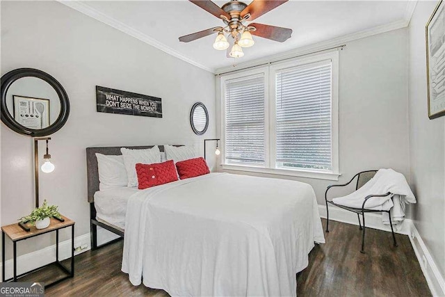 bedroom with ceiling fan, baseboards, wood finished floors, and crown molding