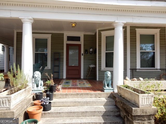 doorway to property with covered porch