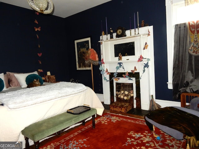 bedroom with wood finished floors