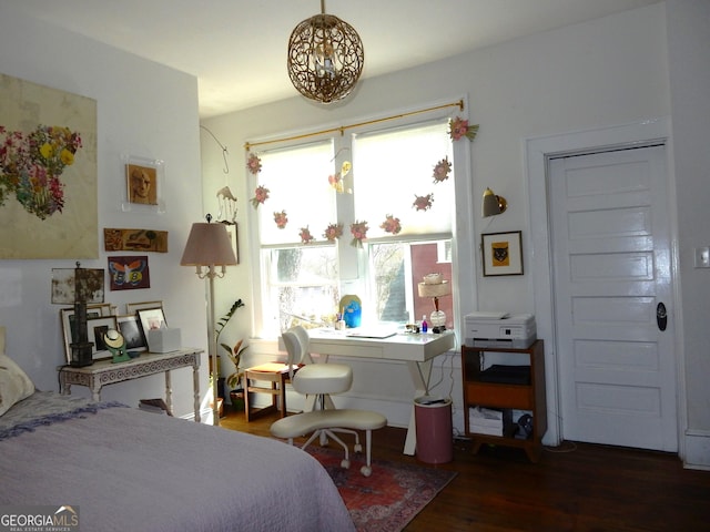 bedroom with wood finished floors