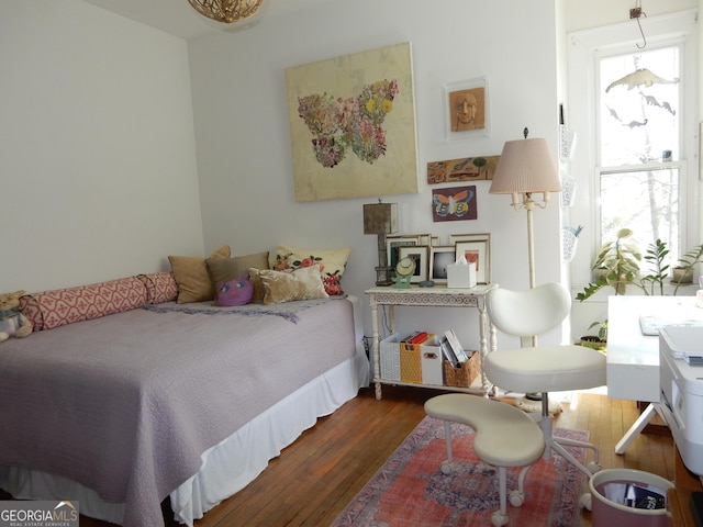 bedroom featuring dark wood-type flooring