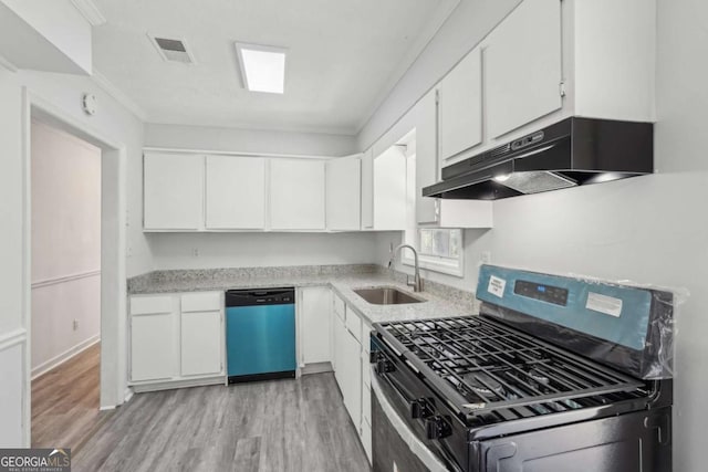 kitchen with stainless steel gas range oven, under cabinet range hood, dishwashing machine, white cabinetry, and a sink