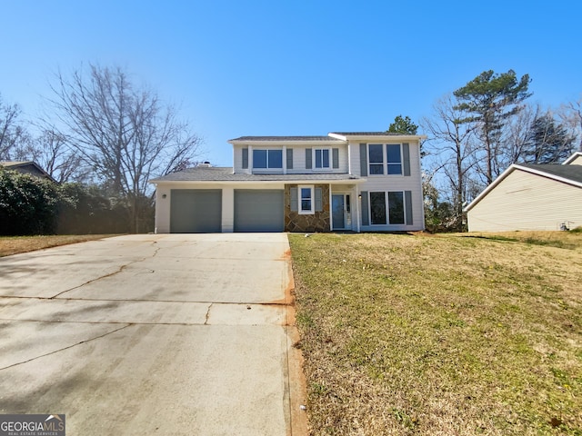 view of front of property featuring a garage, concrete driveway, a front lawn, and stone siding