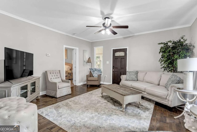 living room with ceiling fan, baseboards, dark wood finished floors, and ornamental molding