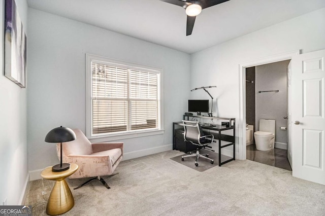 office with baseboards, ceiling fan, and carpet flooring