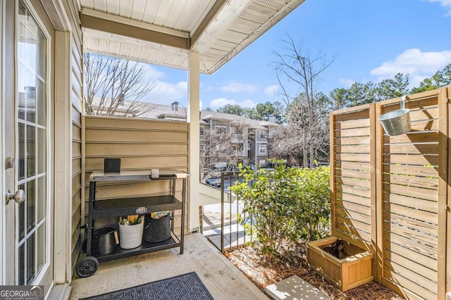 view of patio / terrace with a balcony