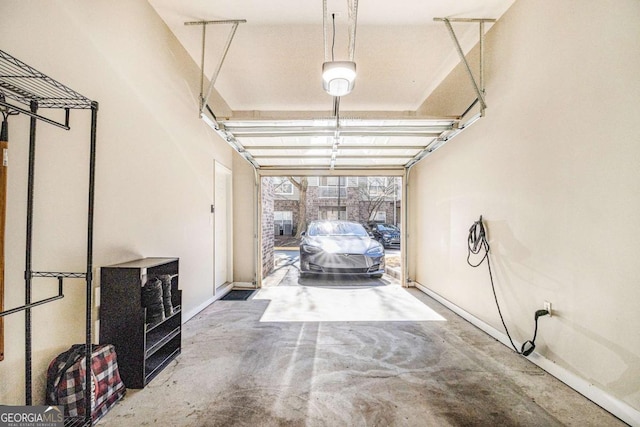 garage featuring baseboards