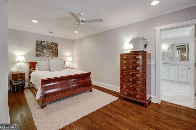 bedroom featuring recessed lighting, ornamental molding, baseboards, and wood finished floors