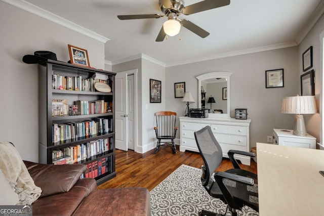 office space featuring ceiling fan, wood finished floors, baseboards, and ornamental molding