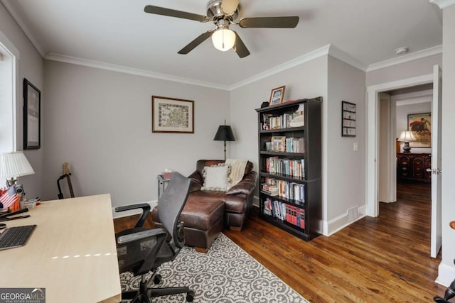 office with wood finished floors, baseboards, and ornamental molding