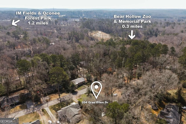 aerial view featuring a view of trees