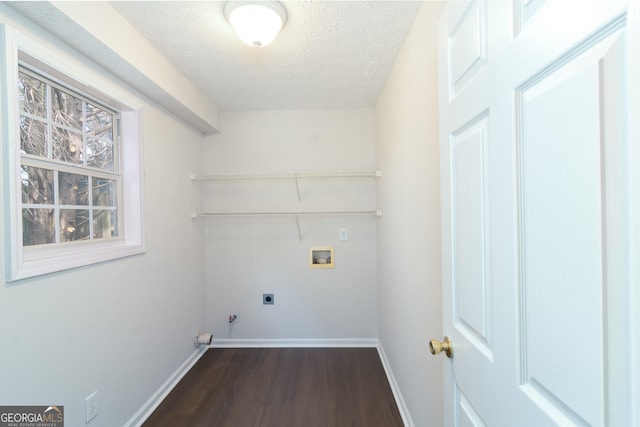 washroom with laundry area, electric dryer hookup, baseboards, and washer hookup