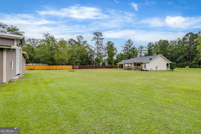 view of yard with fence