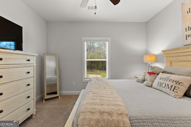 carpeted bedroom with baseboards, visible vents, and ceiling fan