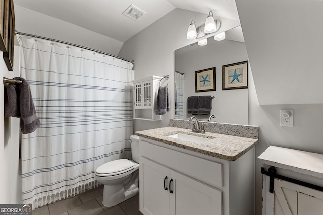 full bathroom with vanity, visible vents, tile patterned flooring, vaulted ceiling, and toilet