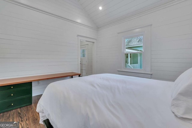 bedroom featuring dark wood finished floors, recessed lighting, and vaulted ceiling