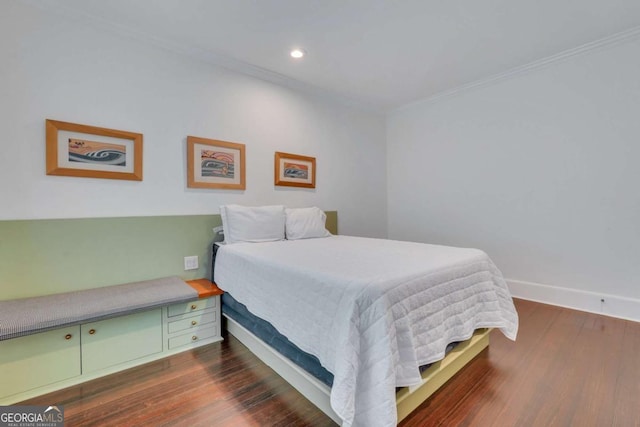 bedroom featuring recessed lighting, baseboards, dark wood-style flooring, and ornamental molding