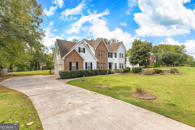 view of front of home with brick siding and a front lawn