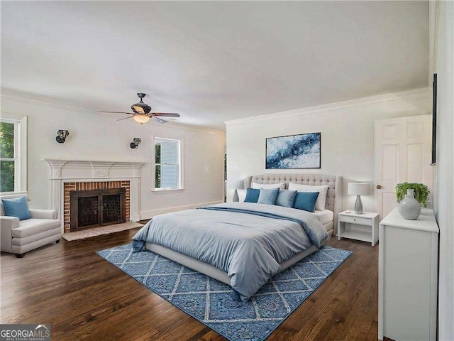 bedroom with a ceiling fan, a fireplace, wood finished floors, and crown molding