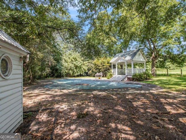 view of swimming pool with a gazebo