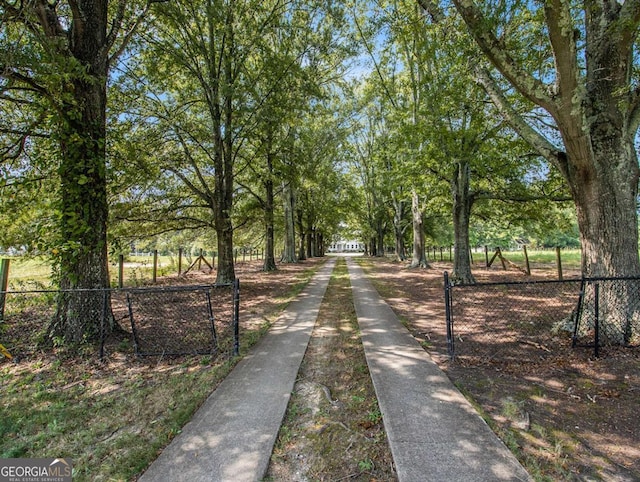 view of community with fence