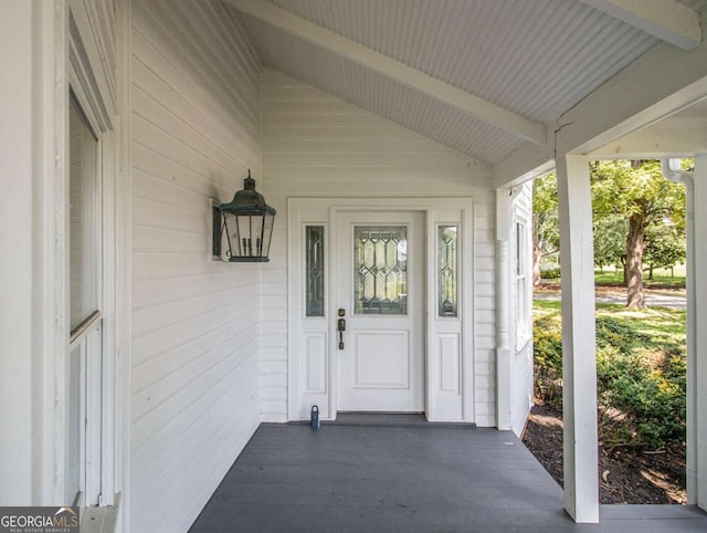 entrance to property with a porch