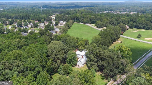 bird's eye view featuring a view of trees