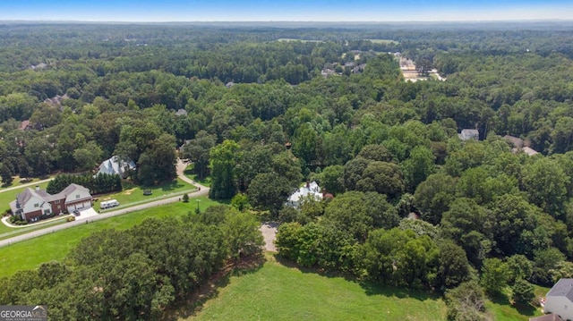 bird's eye view featuring a view of trees