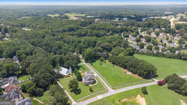 bird's eye view featuring a forest view