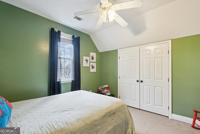 bedroom with visible vents, light carpet, lofted ceiling, a ceiling fan, and baseboards