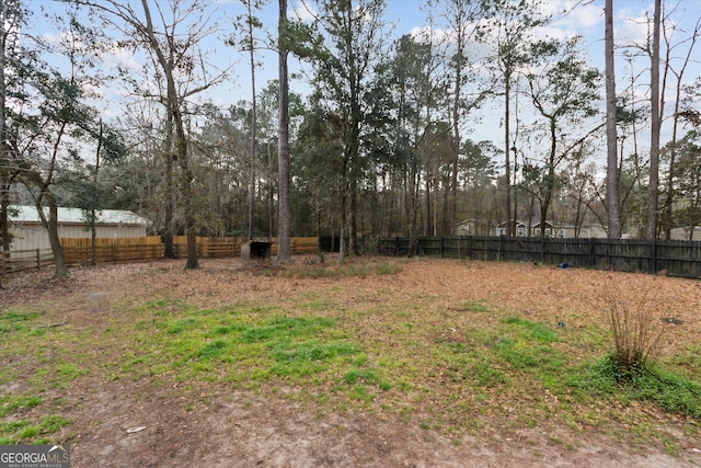 view of yard featuring fence