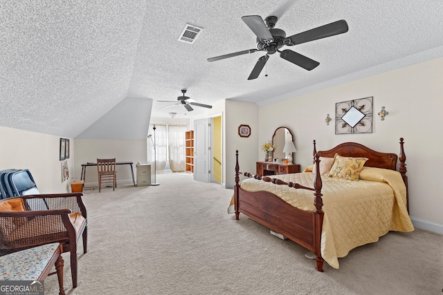 bedroom featuring ceiling fan, carpet flooring, visible vents, and a textured ceiling