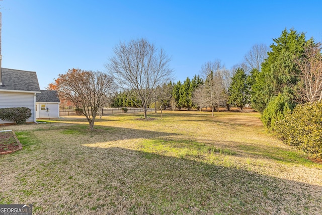 view of yard with fence