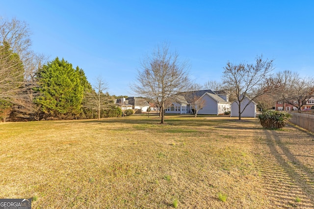 view of yard featuring fence