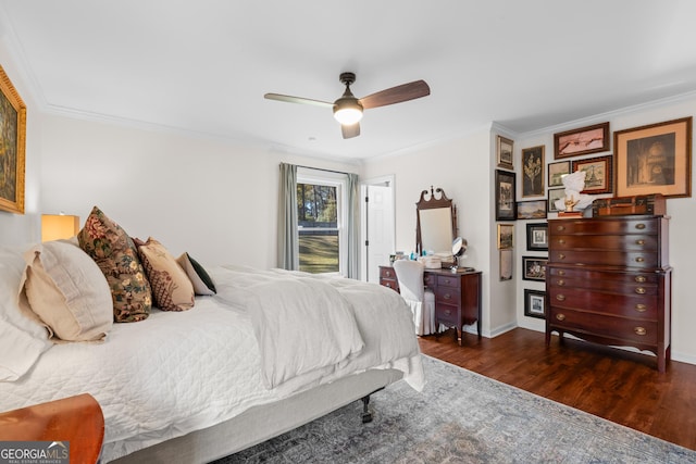 bedroom with a ceiling fan, wood finished floors, and crown molding