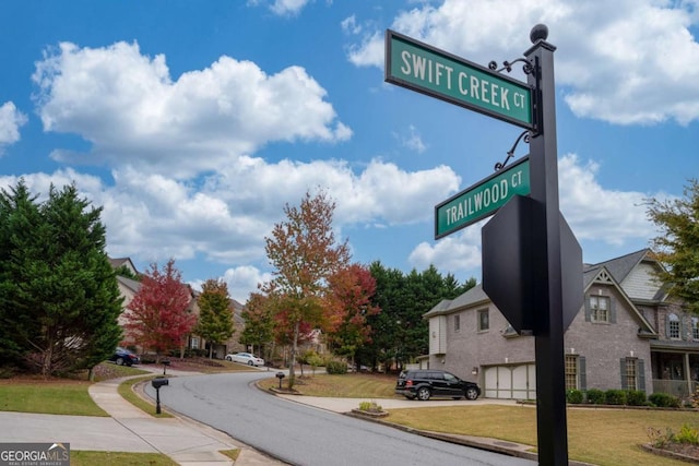 view of road featuring curbs and sidewalks