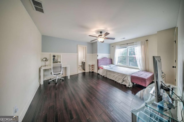 bedroom with ceiling fan, visible vents, baseboards, and wood finished floors