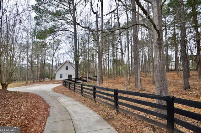 view of road with driveway