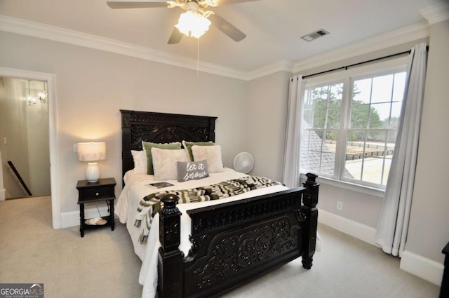 bedroom featuring multiple windows, carpet, visible vents, and ornamental molding