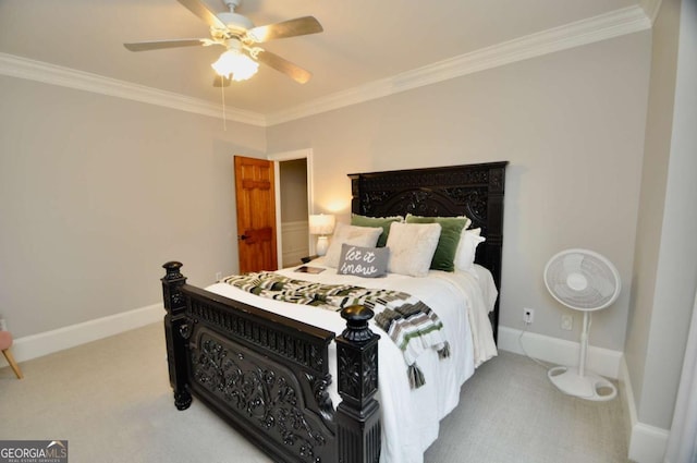 bedroom with baseboards, ornamental molding, and carpet flooring