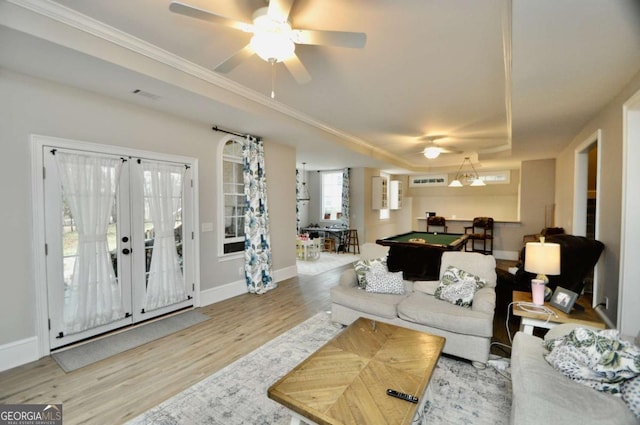 living room with visible vents, pool table, baseboards, french doors, and wood finished floors