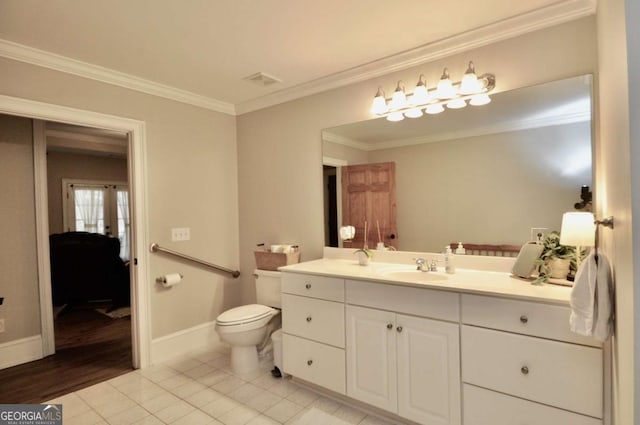 bathroom featuring tile patterned flooring, crown molding, baseboards, toilet, and vanity